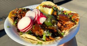 a plate full of tacos